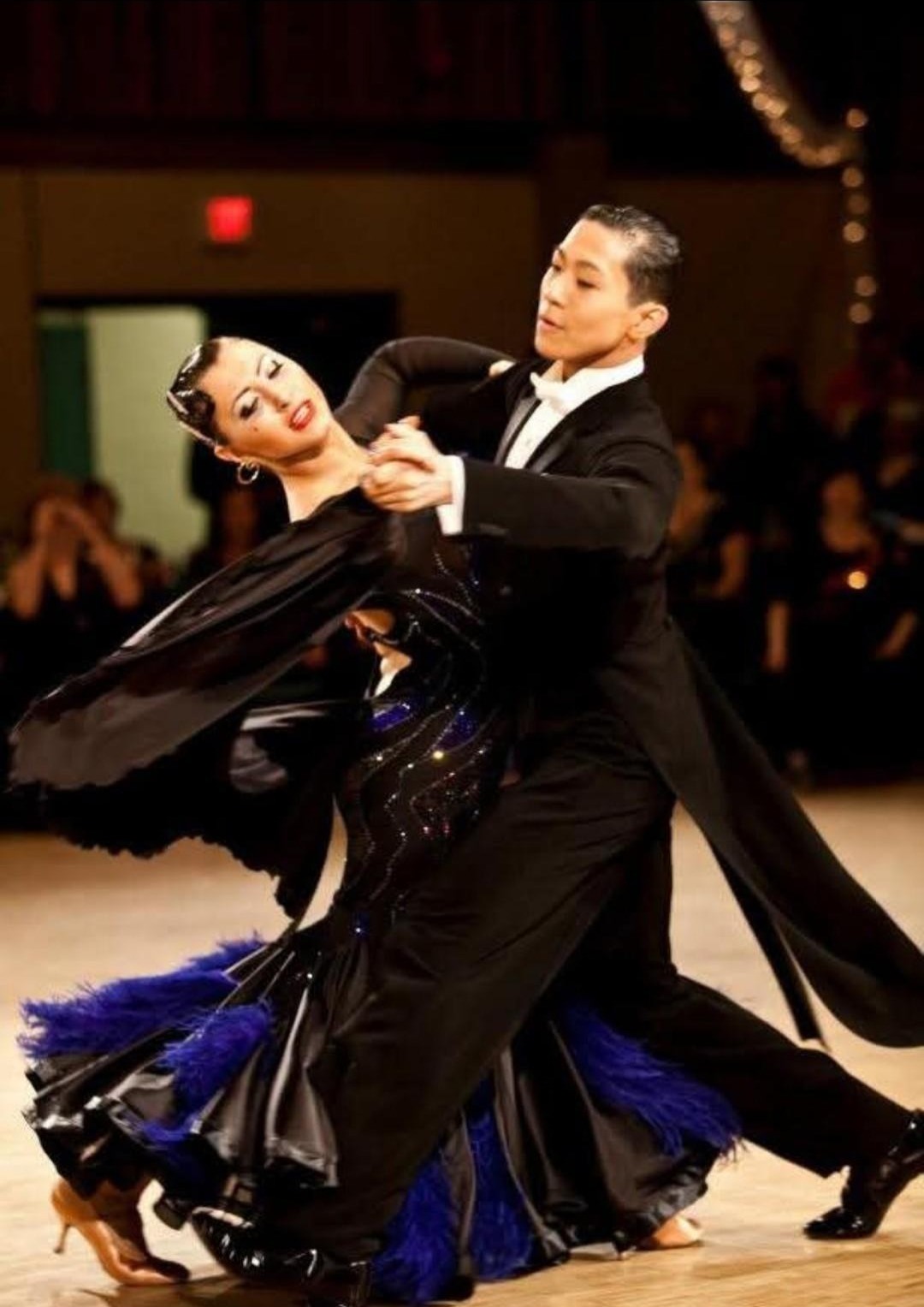 Ksenia Michtchenko performing a ballroom dance